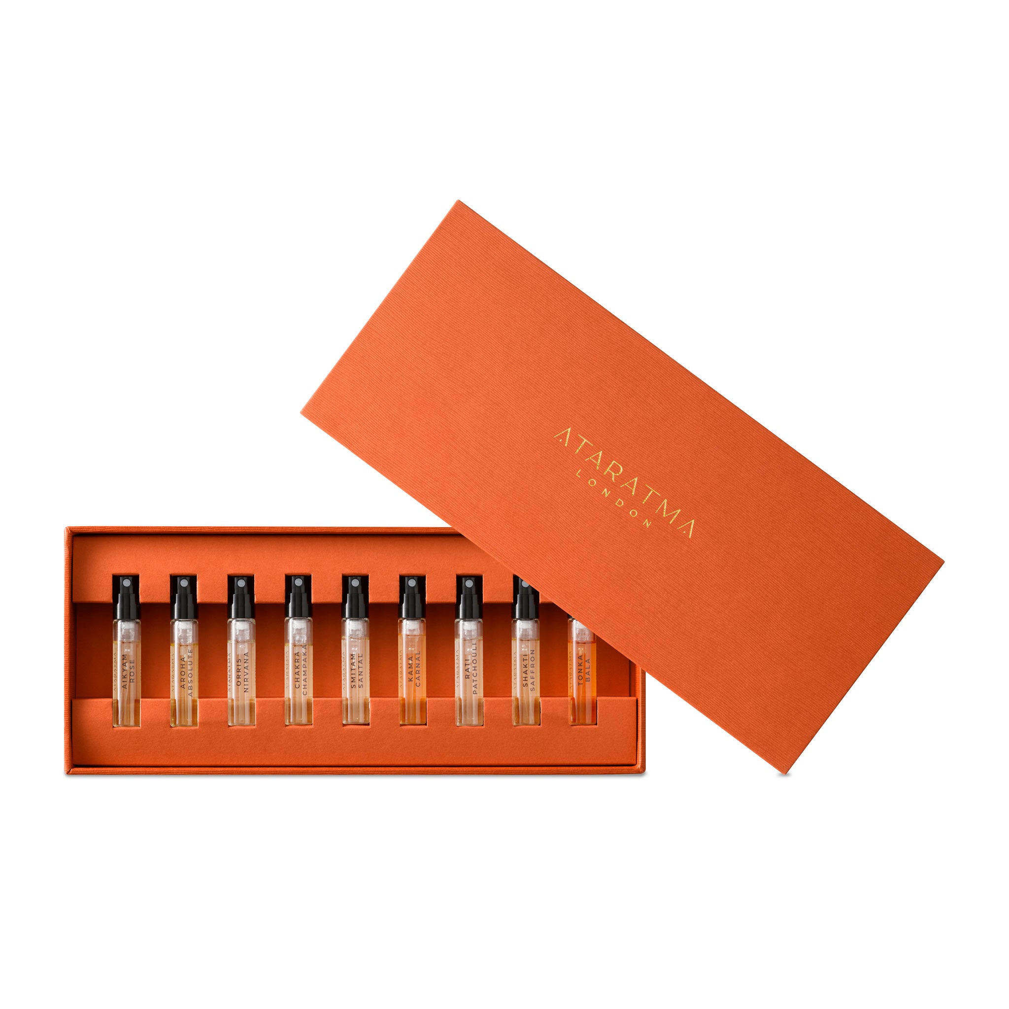 Ataratma Discovery sample set with 9 2ml perfume vials inside the presentation box with the lid offset on the top right corner.