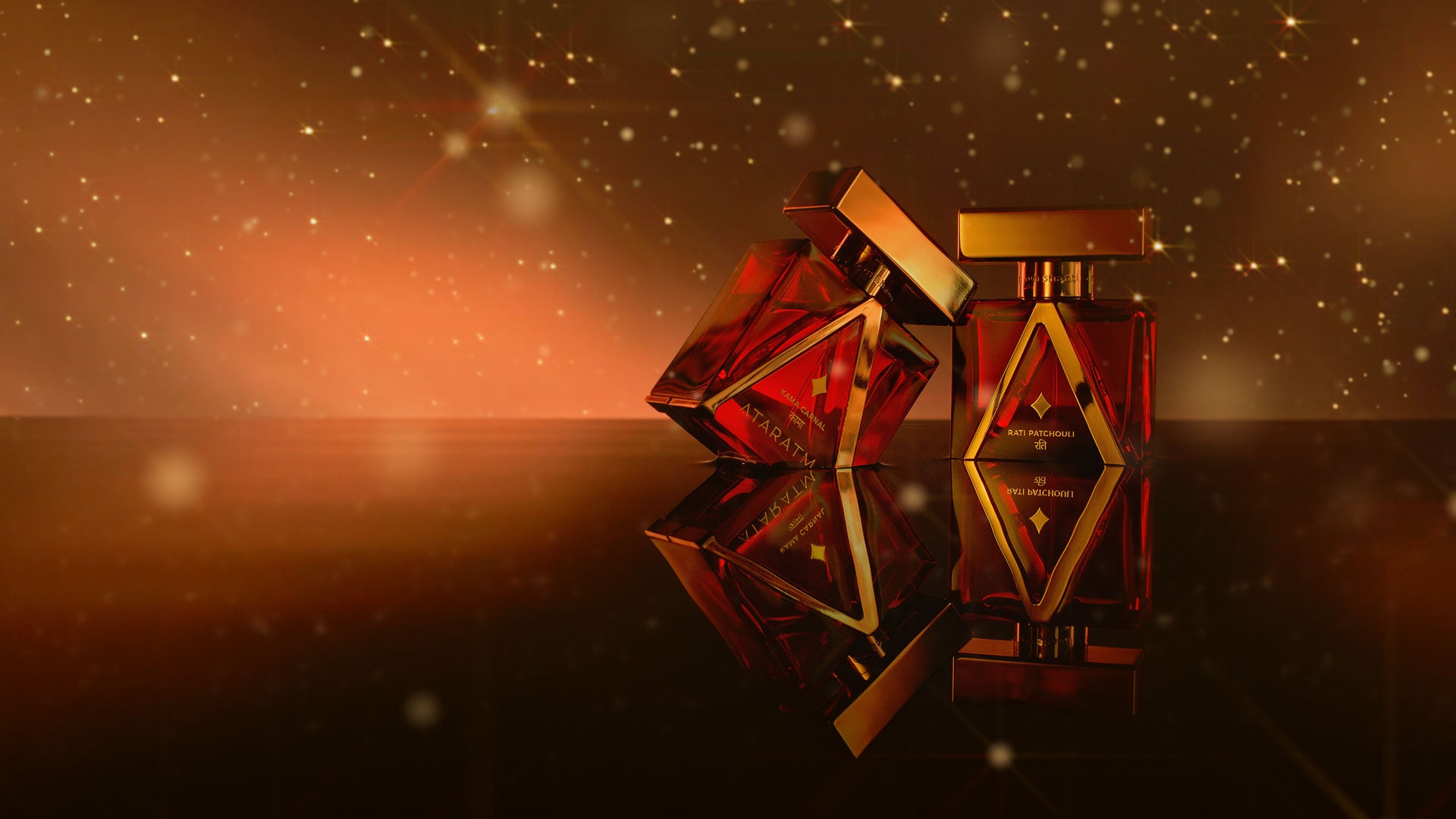 Kama collection of perfumes against a Christmassy backround